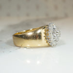 Dazzling Diamond Cluster on Curvaceous Gold Band