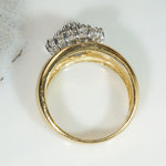 Dazzling Diamond Cluster on Curvaceous Gold Band