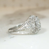 Old Mine Cut Diamond Cluster in Ornate Platinum Engagement Ring