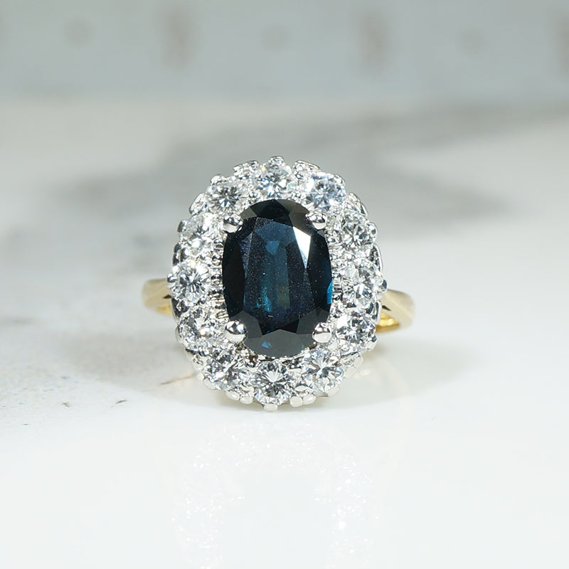 Stunning Vintage Oval Sapphire Diamond Halo Ring