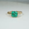 Enchanting Emerald in Engraved Gold Solitaire Ring