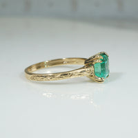 Enchanting Emerald in Engraved Gold Solitaire Ring