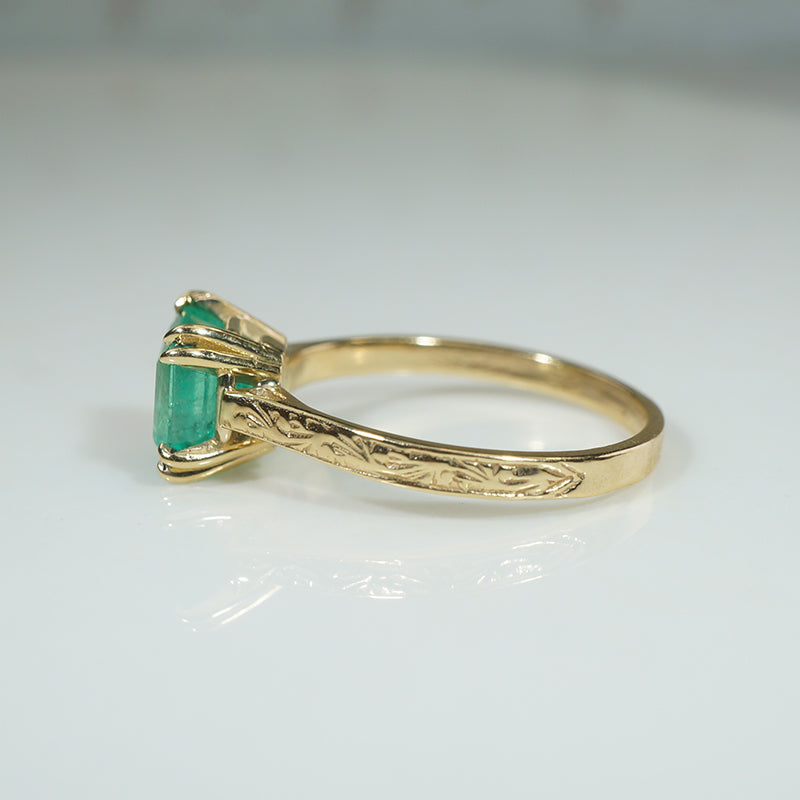 Enchanting Emerald in Engraved Gold Solitaire Ring