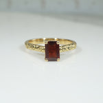 Emerald-Cut Garnet in Sculpted Gold Solitaire Ring