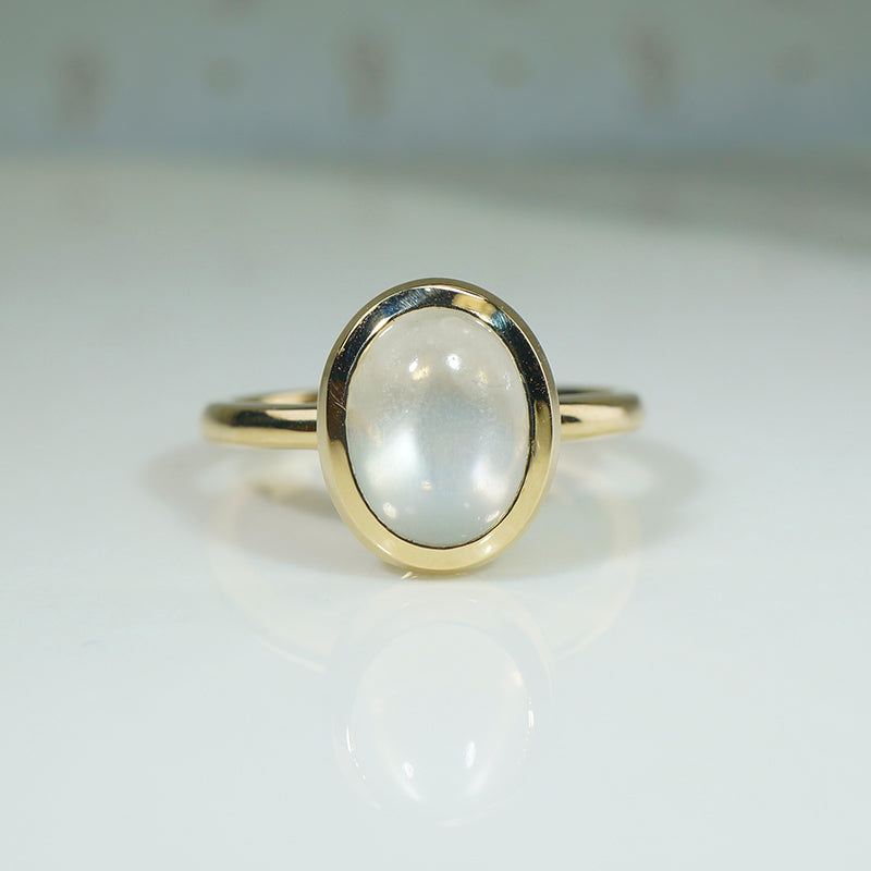 Luminous Moonstone in Curvaceous Gold Ring