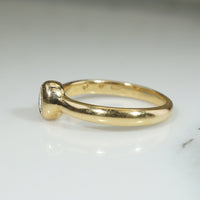 Oval Diamond Bezel Set in Buttery Gold Solitaire Ring