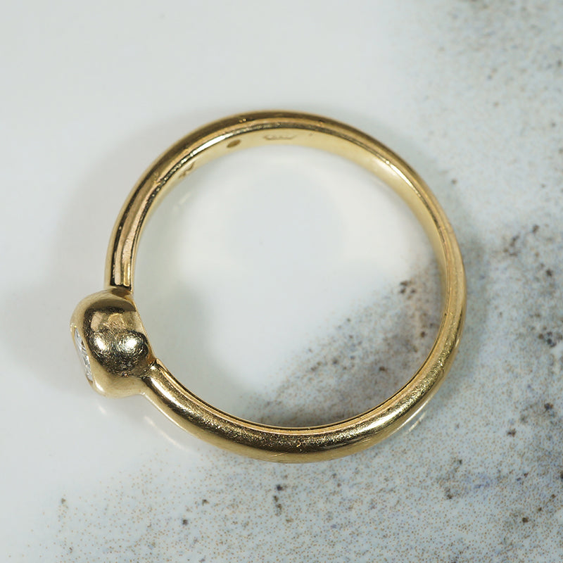 Oval Diamond Bezel Set in Buttery Gold Solitaire Ring