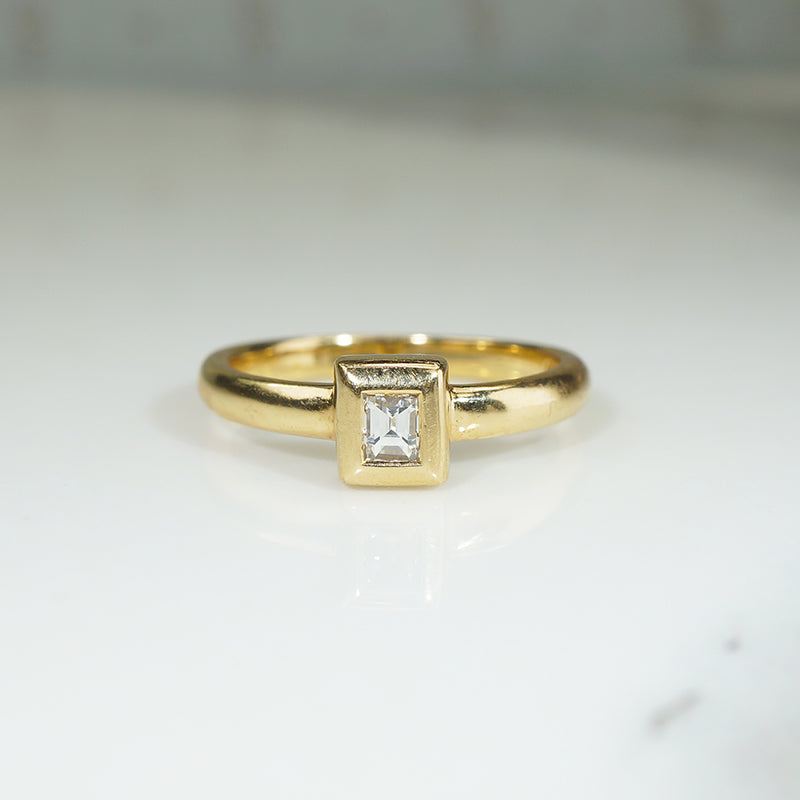 Emerald Cut Diamond in 18k Gold Bezel Solitaire Ring