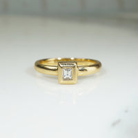 Emerald Cut Diamond in 18k Gold Bezel Solitaire Ring