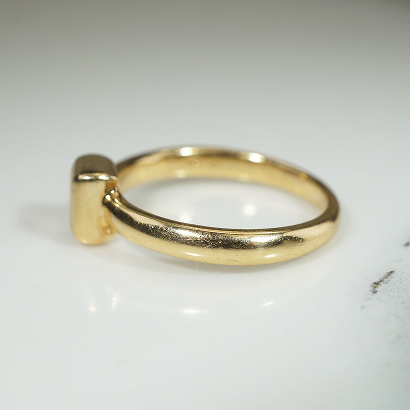 Emerald Cut Diamond in 18k Gold Bezel Solitaire Ring