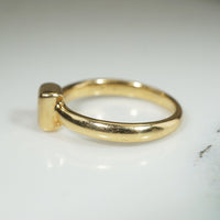 Emerald Cut Diamond in 18k Gold Bezel Solitaire Ring
