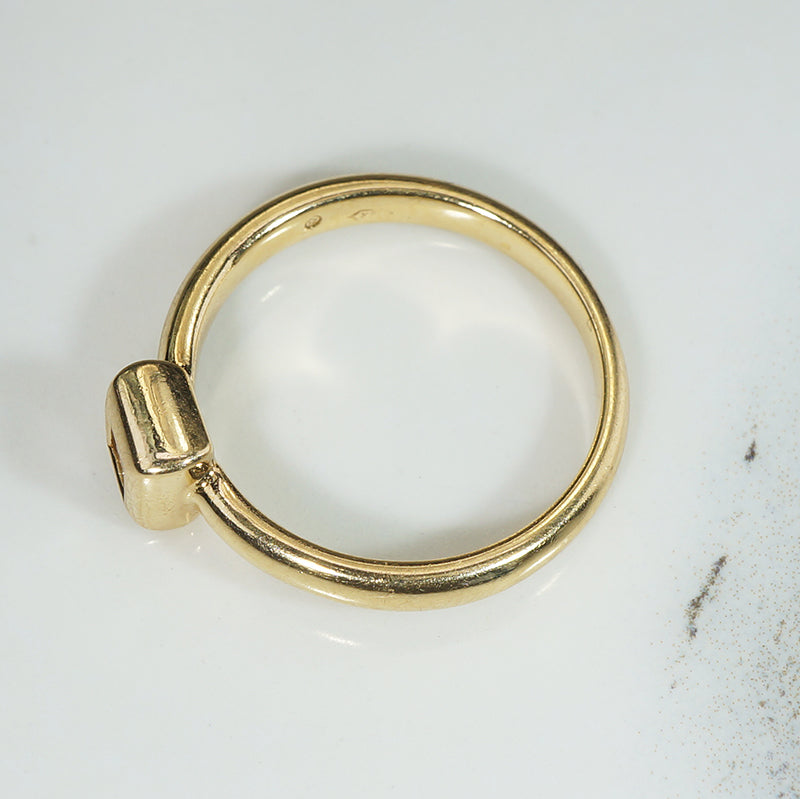 Emerald Cut Diamond in 18k Gold Bezel Solitaire Ring