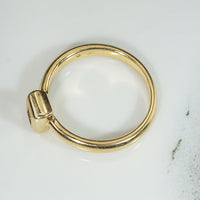 Emerald Cut Diamond in 18k Gold Bezel Solitaire Ring