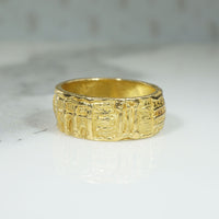 Buttery 18k Gold Band with Roman Motif