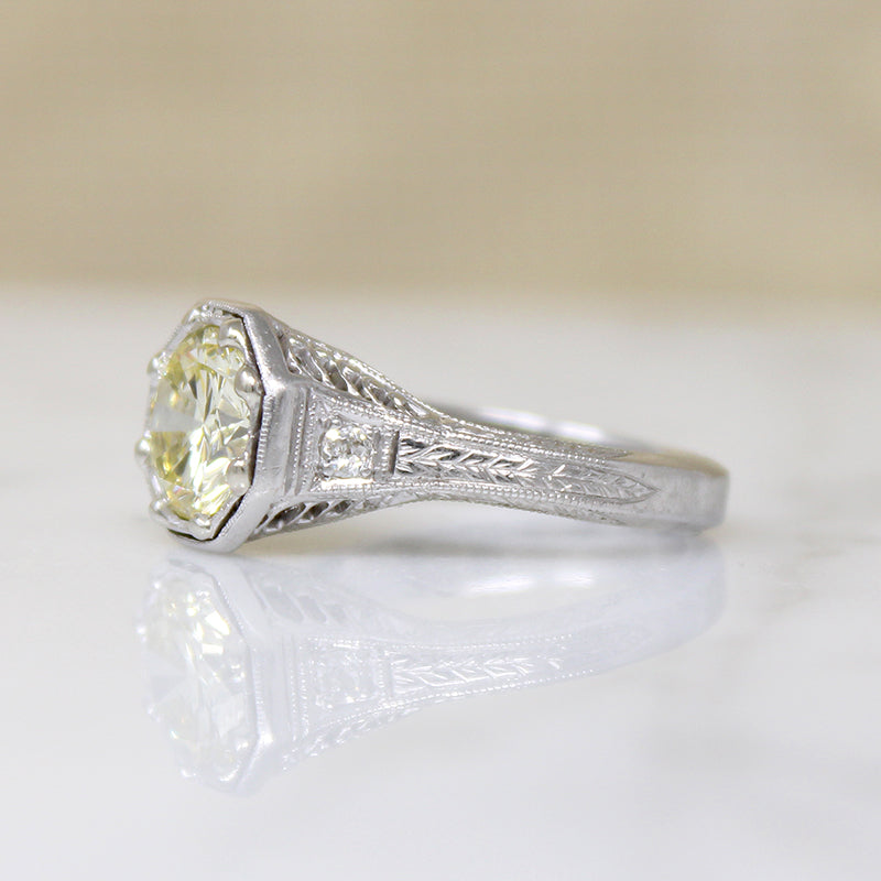 Pale Yellow Diamond in Glamorous Platinum Engagement Ring