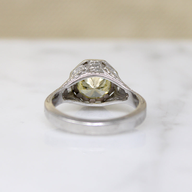 Pale Yellow Diamond in Glamorous Platinum Engagement Ring
