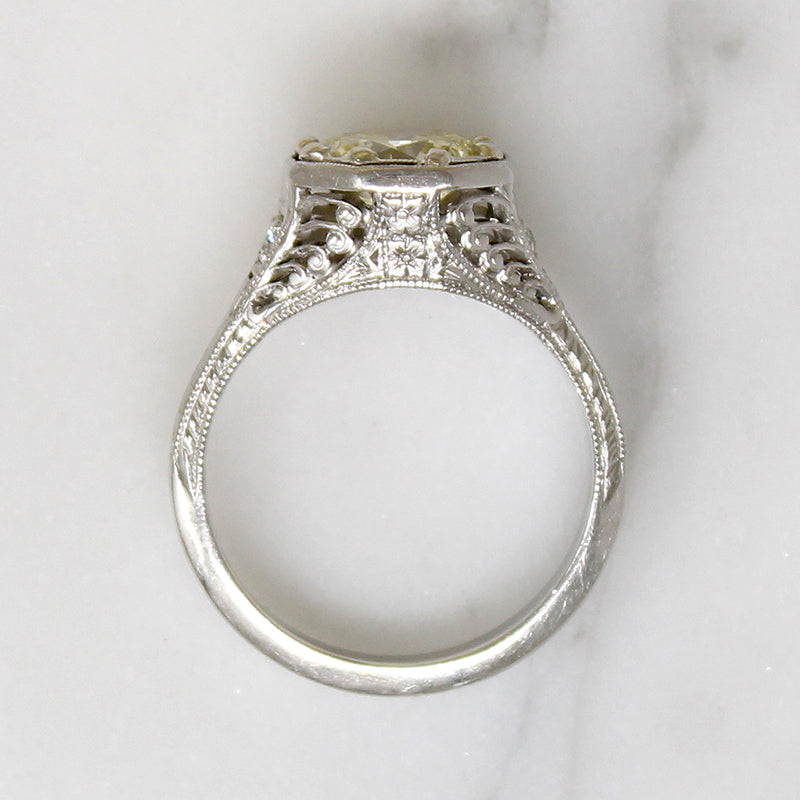 Pale Yellow Diamond in Glamorous Platinum Engagement Ring