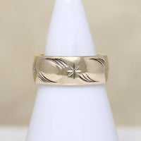 Wide Gold Band Engraved with Stars & Flourishes 