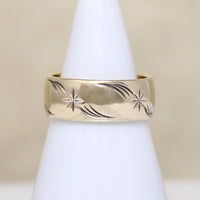 Wide Gold Band Engraved with Stars & Flourishes 
