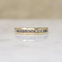 Stylish Channel Set Diamond & 10k Gold Tapered Band