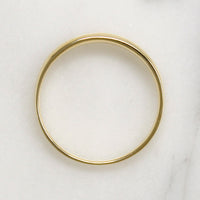 Tapered 10k Gold Band with Channel Set Diamonds