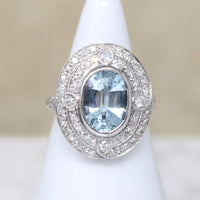 Heavenly Aquamarine & Diamond Swirling Halo Ring