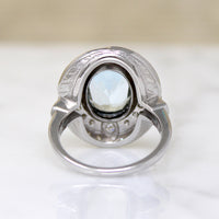 Heavenly Aquamarine & Diamond Swirling Halo Ring