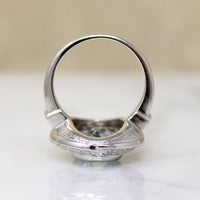 Heavenly Aquamarine & Diamond Swirling Halo Ring