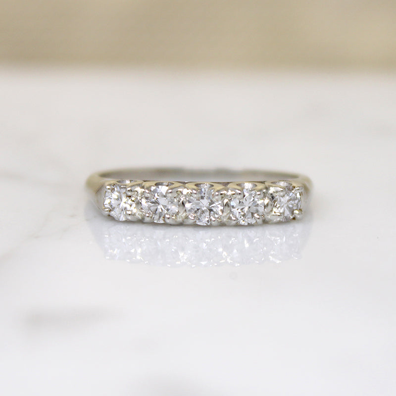 Five Sparkly Diamonds in 18k White Gold Band