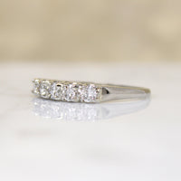 Five Sparkly Diamonds in 18k White Gold Band