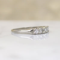 Five Sparkly Diamonds in 18k White Gold Band