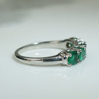 Brilliant Green Emerald and Platinum Band