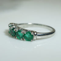 Brilliant Green Emerald and Platinum Band