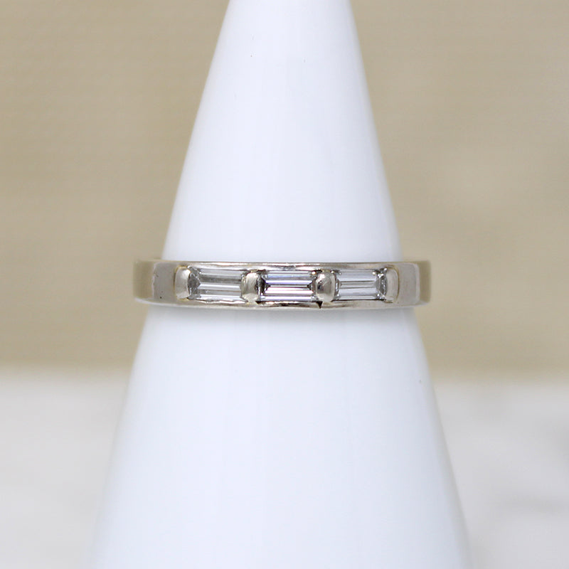 Three Baguette Diamonds in Flat White Gold Band
