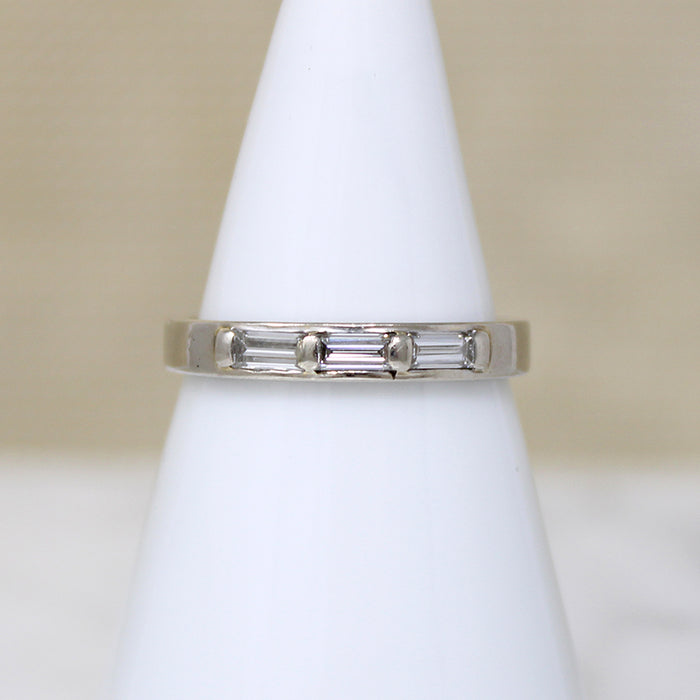 Three Baguette Diamonds in Flat White Gold Band