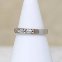 Three Baguette Diamonds in Flat White Gold Band