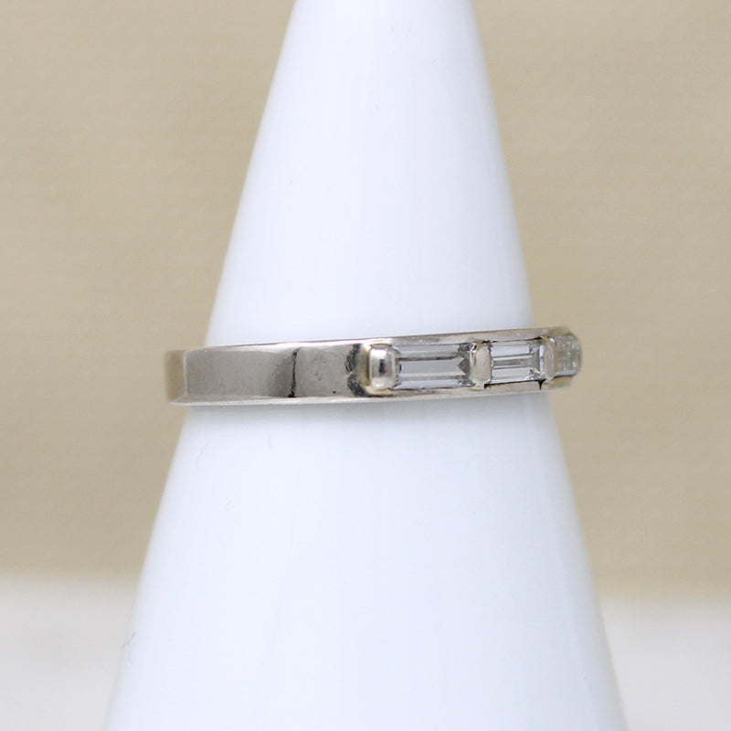 Three Baguette Diamonds in Flat White Gold Band