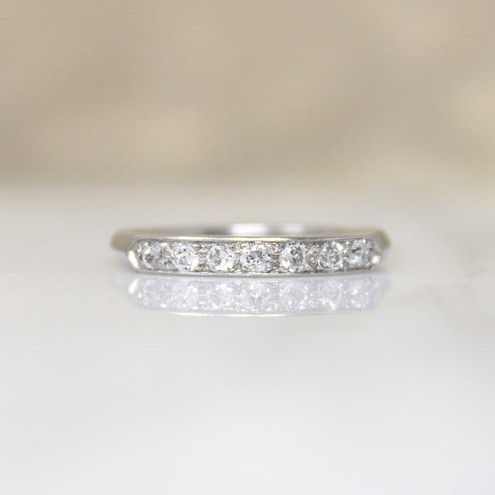 Chic & Sleek Seven Diamond Platinum Wedding Band