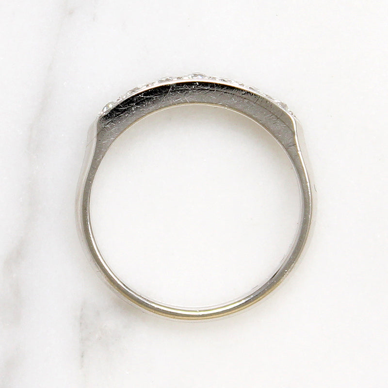 Chic & Sleek Seven Diamond Platinum Wedding Band