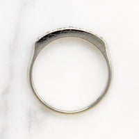 Chic & Sleek Seven Diamond Platinum Wedding Band