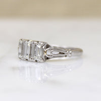 Art Deco Emerald Step Cut Diamond Trilogy Ring