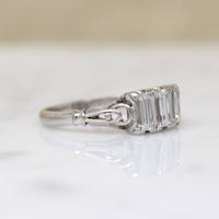 Art Deco Emerald Step Cut Diamond Trilogy Ring