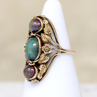 Black Opals in Lush Arts & Crafts Botanical Ring