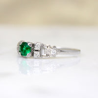 Captivating Emerald & Diamond Buckle Ring