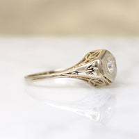 Pale Yellow Gold Foliate Motif Diamond Solitaire