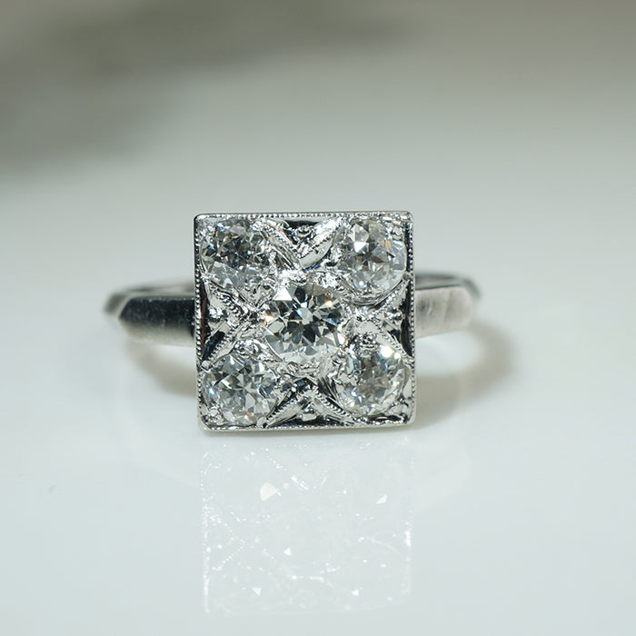 Brilliant Platinum and OMC Diamond Ring