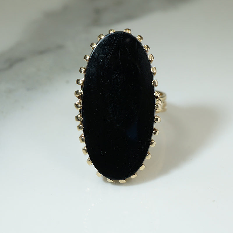 Bold 1960s Onyx and Gold Ring