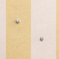 Tiny 14k Gold Bezel Diamond Studs
