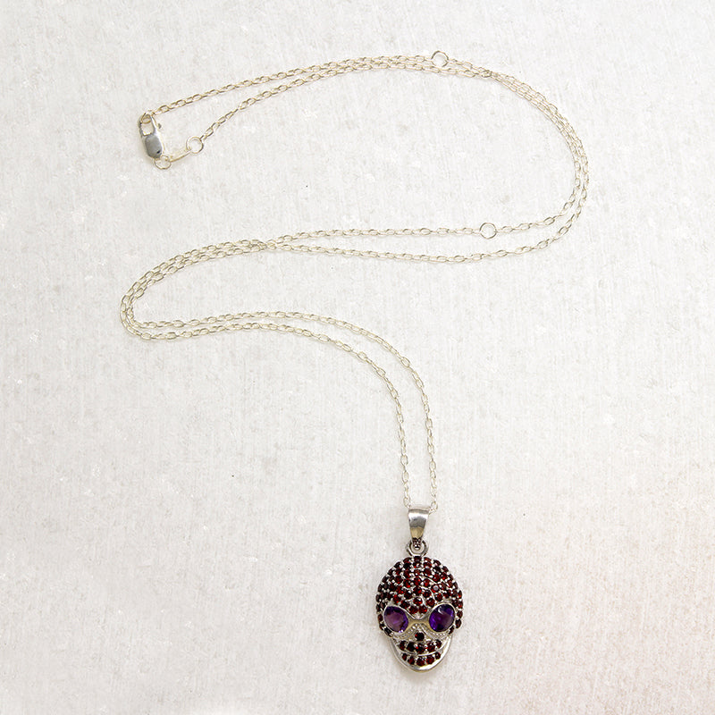 Garnet Studded Sterling Silver Artisan Skull Pendant