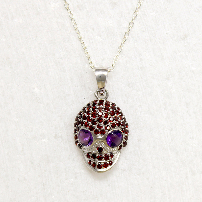 Garnet Studded Sterling Silver Artisan Skull Pendant
